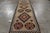 Handwoven in wool circa 1920, this 4x13 antique Persian Kilim and gallery runner is an exciting new curation from Rug &...