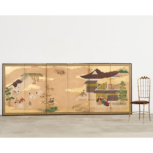 Fascinating pair of large Japanese 19th century Edo period six-panel folding byobu screens depicting the legend of...
