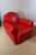 Pair of red leather club chairs with removable cushions, in excellent condition, and very comfortable seats. DIMENSIONS:...