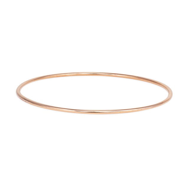 Chic vintage bangle bracelet crafted in 19 karat Portuguese rose gold (circa 1980s). Simple and elegant, the bangle is...
