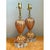 Exemplifying the pinnacle of mid-century Venetian glassmaking, this exceptional pair of Italian Murano table lamps...