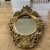 Beautifully carved wooden mirror with frame carved “Made in Italy” under the wooden-backed mirror. A truly lovely piece,...