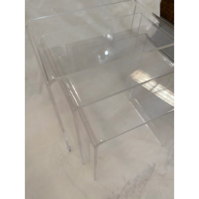 Stunning set of lucite nesting tables. These are the coolest pieces ever and can fit into nearly any decor. I wouldn't...