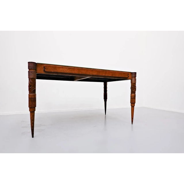 Italian extendable dining table by Pier Luigi Colli, 1940s Measure: W 148-207 cm. This piece is attributed to the...