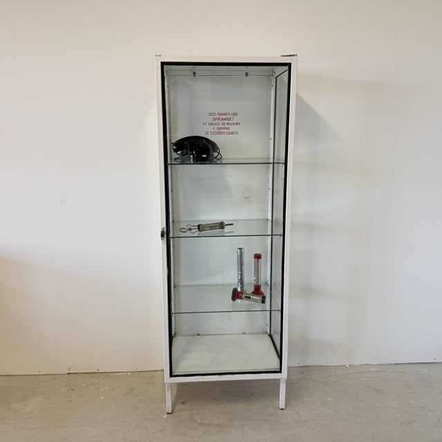 This authentic medical display cabinet was manufactured in the 1960s by Fabryka Sprzętu Szpitalnego in Chełmno, Poland....