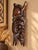 An exceptionally sculptural vintage hand-carved hardwood wall mask inspired by the Maya Maize God, or Corn God, an...
