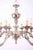Beautiful chandelier made of white metal. The chandelier is polished to a high shine. Fully functional - electrical...