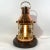 Highly polish and lacquered ship's masthead lantern. With clear Fresnel glass lens. Vented top, brass carry handle....