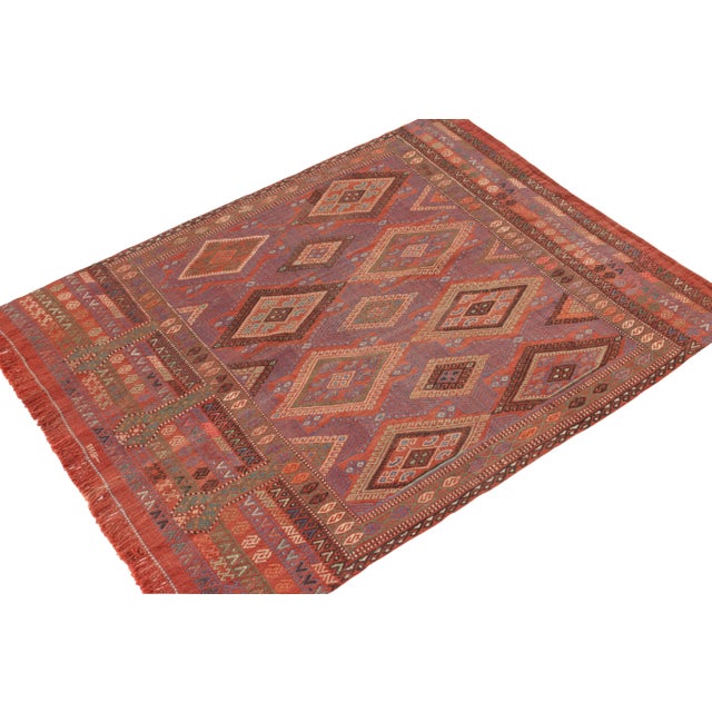 This vintage 4×6 Kilim is a rare tribal curation in Rug & Kilim’s collection. Handwoven in wool, it originates from Turkey...