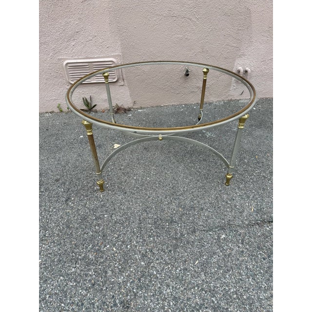 This Coffee table is style is Italian and come with a glass top.