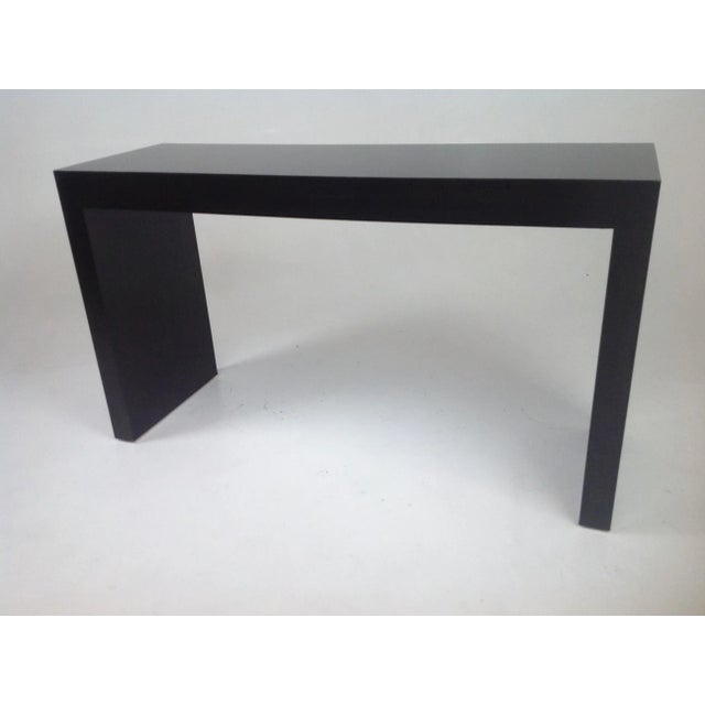 Custom made console done in a espresso finish. The console has clean lines. The dims are 34" tall 4 ‘long and 20" deep....