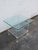 This classic Two Tiers Side Table is made of Lucite and glass. This Side Table has Hollywood Regency design, the Lucite...