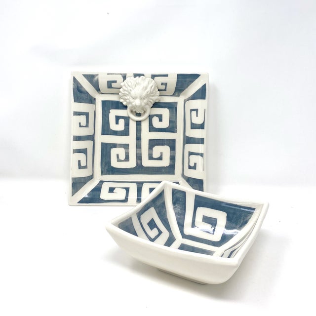 A compact square tray in a solid graphite glaze with a hand-painted Greek key border. Made in Italy. As hand-painted work,...