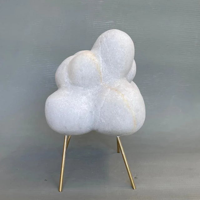 Cloud with bronze sticks marble sculpture by tom von kaenel dimensions: d 25 x w 20 x h 30 cm materials: marble tom von...