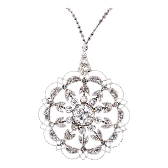 Exquisite Platinum Flower Pendant With Authentic Earth Mined Diamonds and Chain For Sale