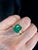7 ct. Emerald Estate FH custom Yellow 14k gold ring with 2 Pear-shaped Diamond side stones. Emerald: 7.10 ct weight Grade...