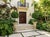 Pair of Neoclassical Fluted Cast Stone Garden Urns For Sale - Image 10 of 12