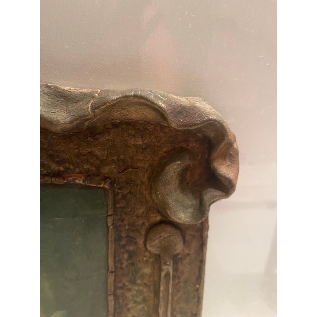 19th-century French still life oil painting features a depiction of fruit and a silver pitcher. The bottom edge of the...