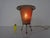 Three-legged table lamp made of woven metal from the 1950s. European Plug (up to 250V).The wiring of this item may be...