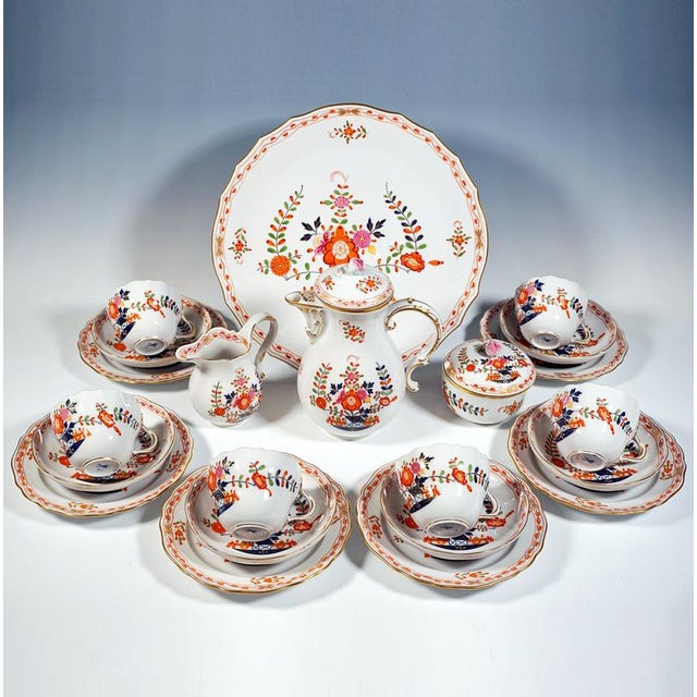 Meissen coffee and tea service, consisting of 22 parts: 1 coffee pot, 1 milk jug, 1 lidded sugar bowl, six cups, six...