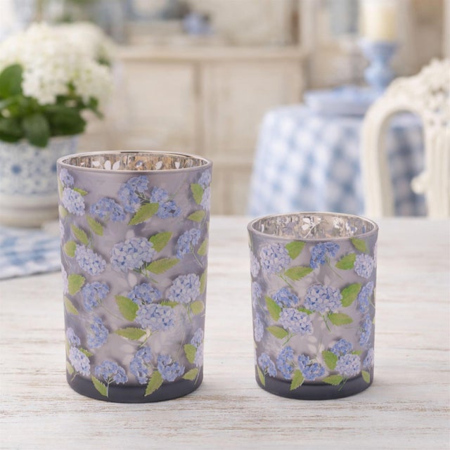 Bring warmth, sophistication, and artistry into your home with this set of floral candle holders. Our candle holders...