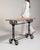 A classic French café table rooted in the culture of early 20th century Parisian bistros, where cast iron bases were used...