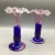 A beautiful pair of Murano hand blown studio art glass floral vases. They start at the base with pink swirl into a cobalt...