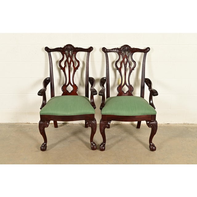 An outstanding pair of Chippendale or Georgian style armchairs or dining captain chairs By Thomasville USA, Circa 1980s...