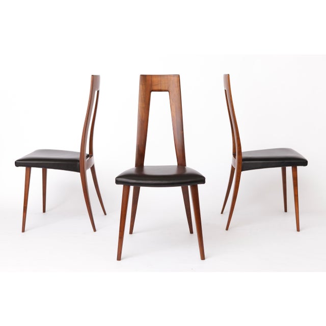 Set of 4 Vintage Chairs by Ernst Martin Dettinger for Veil | Germany, 1960s A set of four vintage chairs designed by...