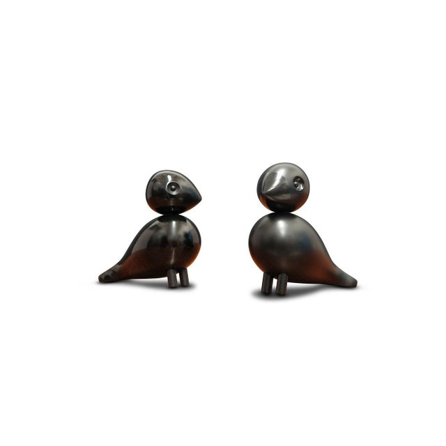 Pair of Kay Bojesen black birds originally designed in 1950. Carved of beech and finished in black gloss and matte. W...