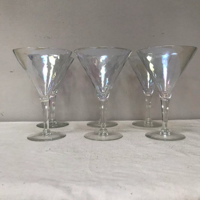 A beautiful set of 6 vintage, iridescent, stemmed, clear glasses. A beautiful soft display of colors is reflected in the...