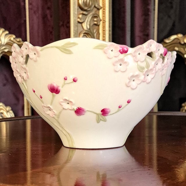 The Vintage Lenox Porcelain Romantic Floral Pink Cherry Blossom Candy Serving Bowl is a charming and decorative piece of...