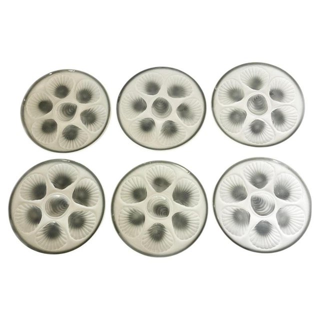 Set of 6 ceramic oyster plates, France, 1970s. A beautiful set of six glazed ceramic oyster plates, each with six...