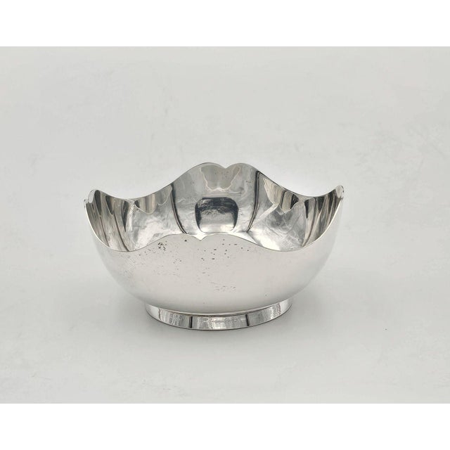 A sterling bowl, U.S.A. circa 1950. Marked "Sterling" with a lyre.