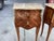 This is pure French elegance. This pair of French side table are made of satinwood and feature exquisite inlay work of...
