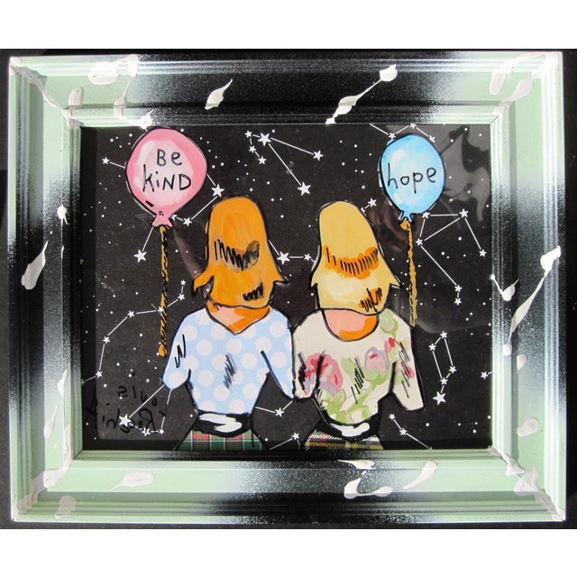 This artwork depicts two figures standing side by side, each holding a balloon that reads "Be Kind" and "Hope," set...