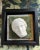 Muse head bust made of plaster styled after Grand Tour intaglio measures 3 1/2" by 2 3/4". Mounted on vintage Schumacher...