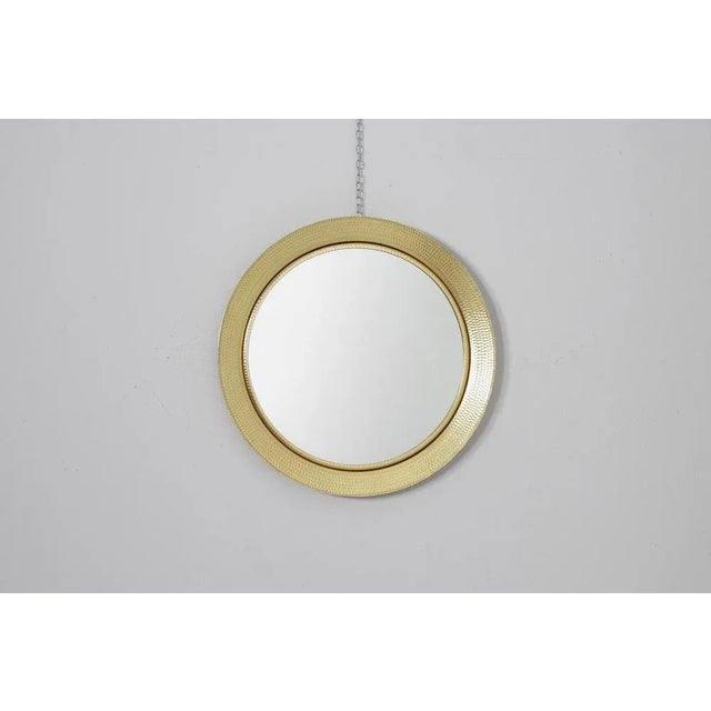 Mid-Century Gilded Aluminium Round Wall Mirror by L. Burchiellaro, 1960, in None conditions. Designed 1960 to 1969