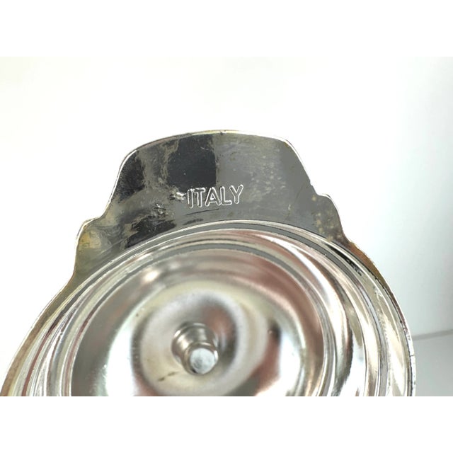 Vintage mid-century Italian claret jug featuring a cut glass body with silverplate mounted lid, spout, and handle. The...