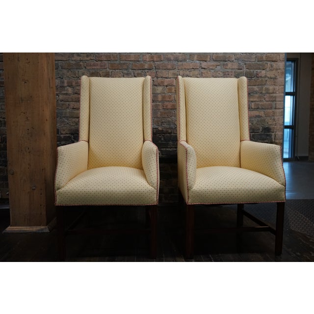 Lovely pair of slim wingback chairs with a Chippendale feel to them. The could certainly work as hostess chairs at a...