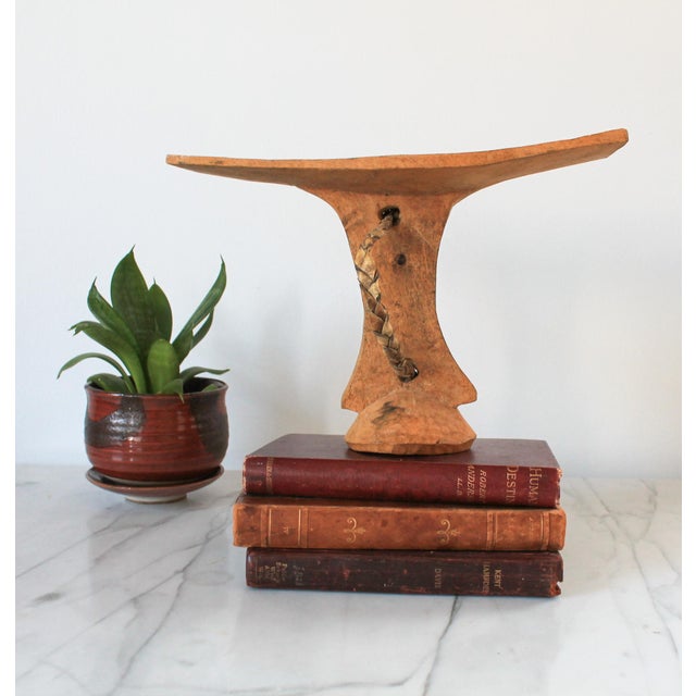 Antique hand carved African wood headrest. No makers mark. Some age wear.