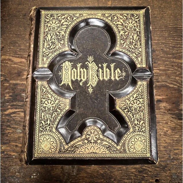 A Holy Bible from 1883 that includes an illustrated history of the New and Old Testaments. This handmade Bible was crafted...