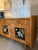 Beautiful sideboard with glazed majolica panels. The patina is perfect, as are the ceramic tiles. A truly special piece. I...