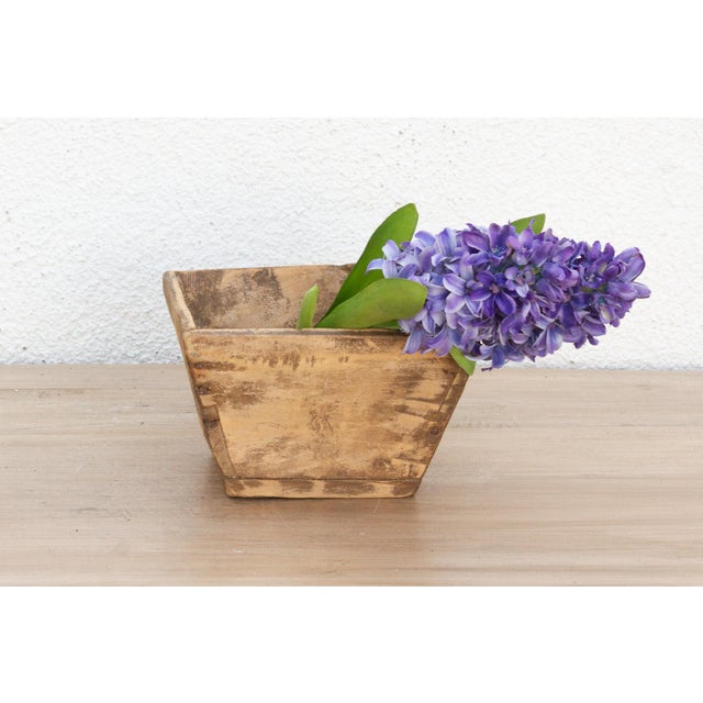 Discover the honest beauty and enduring utility of rural craftsmanship with this charming small vintage wooden bucket....