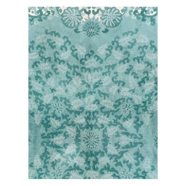 A vintage Chinese Art Deco room size carpet handmade during the mid-20th century in shades of green and cream. Measures:...