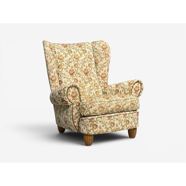 Danish Mid-Century Modern, Large Wingback Lounge Chair, Floral Upholstery, Wood, Denmark, 1950s A substantial wingback...