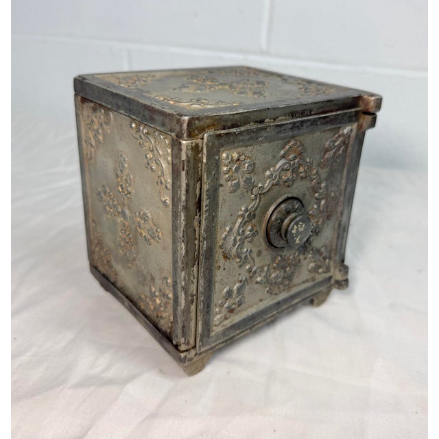 Up for sale is a wonderful antique late 19th century cast Iron Safe still bank. It is a unique, exceedingly rare, and...
