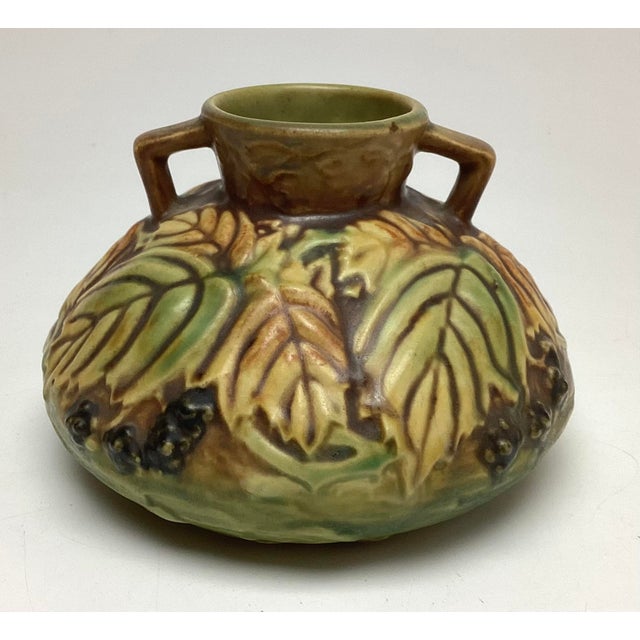Charming Roseville Pottery squat vase in the desirable Blackberry pattern, featuring raised berry and foliate decoration...