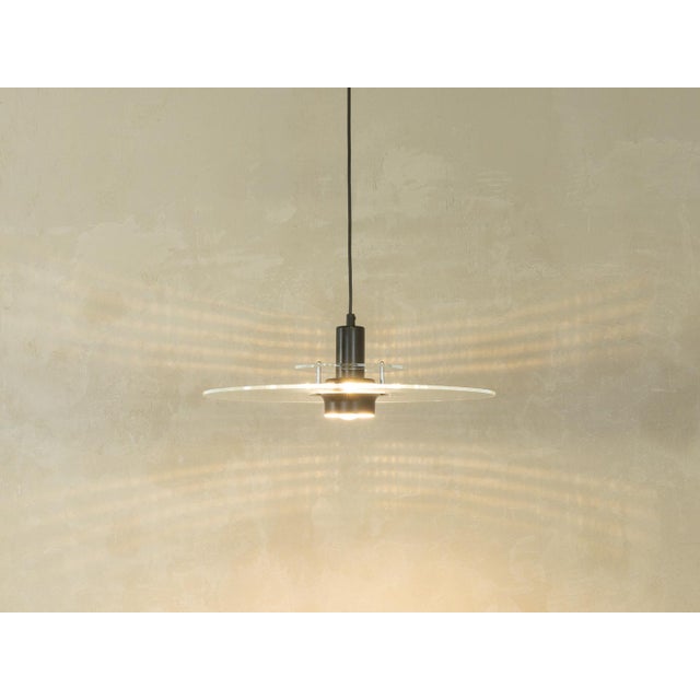 Space Age ceiling lamp from Ikea, dating from the 1980s, with two acrylic glass panels and a black, injection-molded...