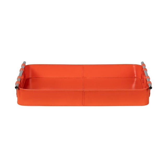 With a bold orange leather, this leather tray is fraught with detail: the topstitching of each leather panel, the narrow...